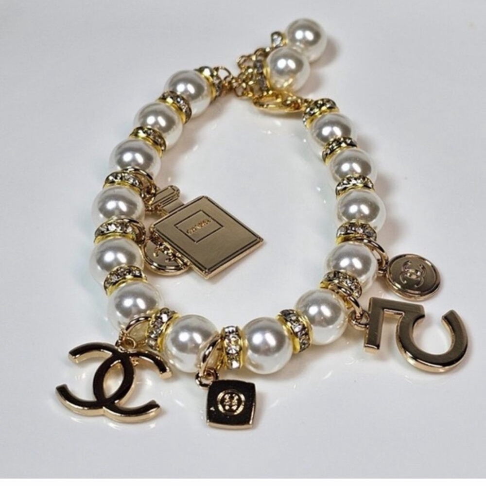 GWP CHANEL Gold-Tone Pearl Charm Bracelet with CC Logo